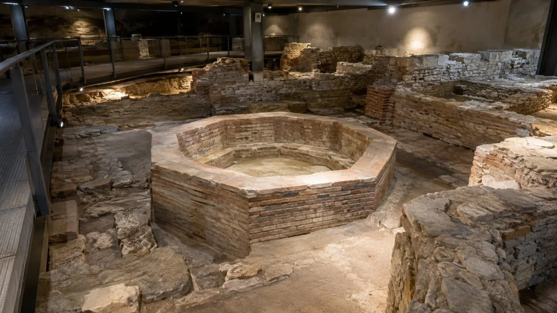 The excavated octagonal basin of the Baptistery of San Giovanni alle Fonti in the archaeological area under the Duomo