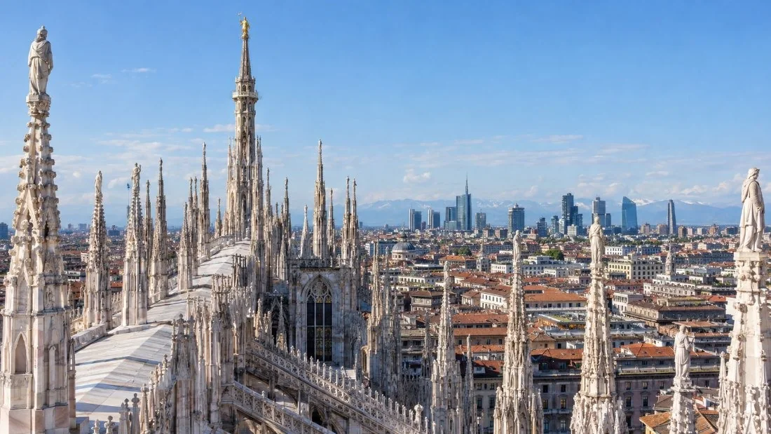 The view from the Duomo terraces over the roofs of Milan toward the modern towers of Porta Nuova